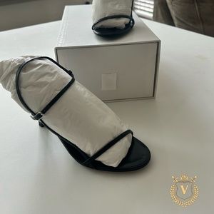 The Row black bare sandal